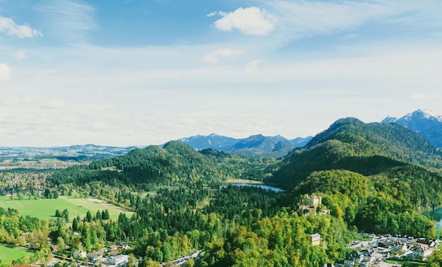 Beautiful nature of European Alps landscape view of alpine mountains lake and village in spring season travel and destination