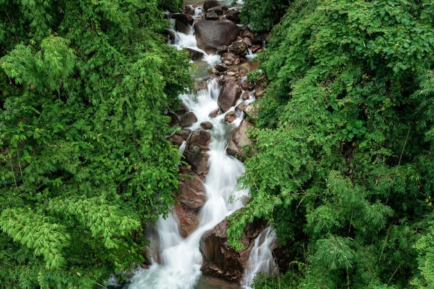 Beautiful nature landscape krating waterfall in the rainy season and refreshing greenery forest