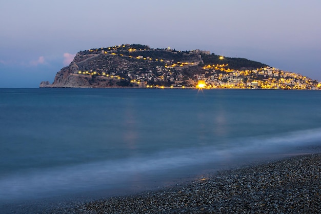 Beautiful night panoramic view of the city Alanya the Mediterranean Sea the Red Tower Alanya Castle