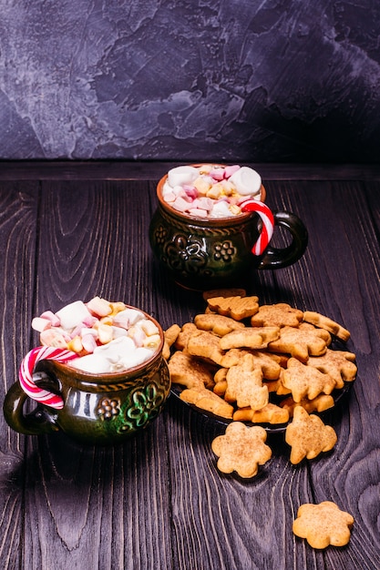 Beautiful old ceramic cups with cookies