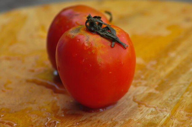 Beautiful organic tomatoes on blurry background selective focus