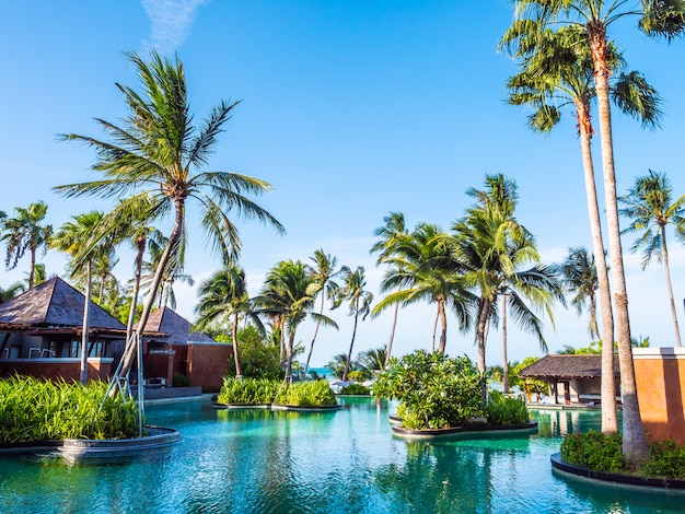 Beautiful outdoor swimming pool with blue sky in hotel and resort