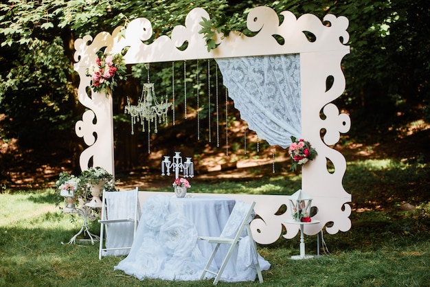 Beautiful pastel wedding ceremony decorations in park