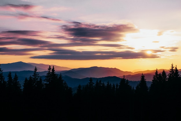 Beautiful peaceful mountains at the sunset in summertime  