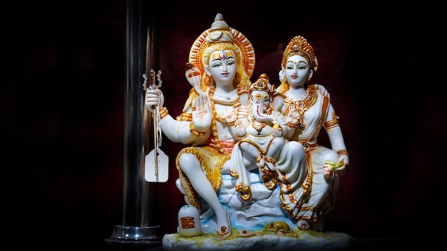 Beautiful picture of shivaparvati and ganesha's sculpture