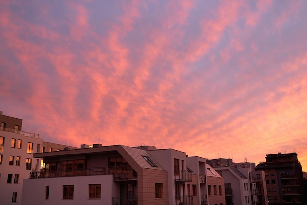 Beautiful pink and blue unusual feather clouds against the sky in sunrise and sunset Scenic fantastic clouds Landscape background Sloudy storm weather forecast climate change global warming