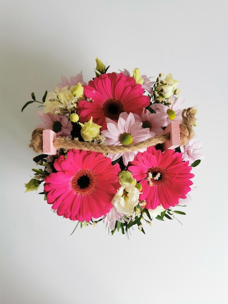 Beautiful pink flower box with gerberas eustoma chrysanthemums pistachios gypsophila