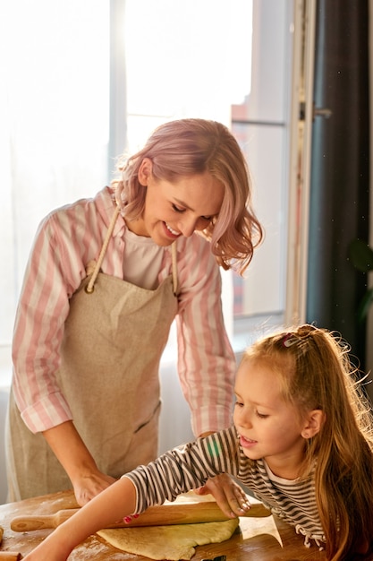 Beautiful portrait of mother and daughter spending time together