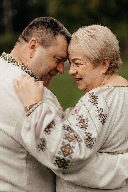 Beautiful portrait senior couple sitting in autumn Slective focus