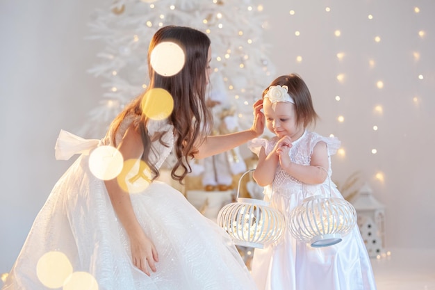 beautiful portrait of a smiling baby girl on a shiny background