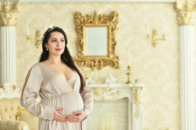 Beautiful pregnant woman posing