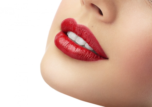 beautiful red female lips with clean white teeth