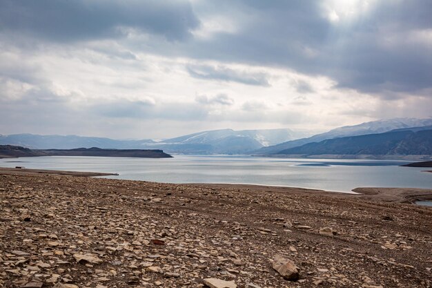 A beautiful reservoir in the mountains Low water level drought and beautiful patterns are visible