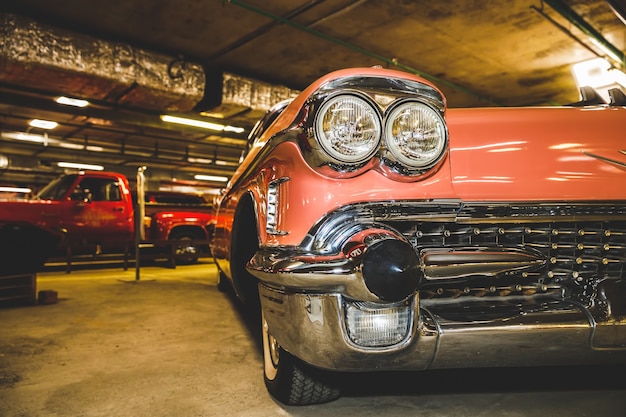 Beautiful retro car of pink color.