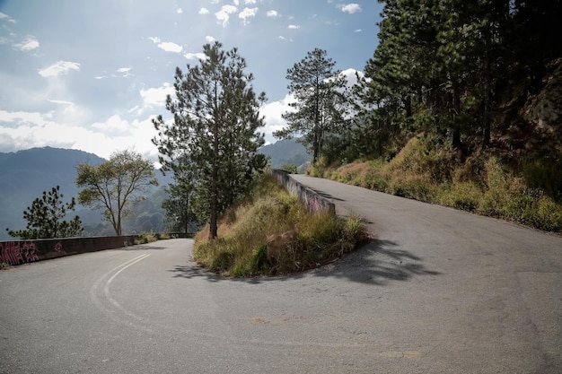 Beautiful road in the mountains with surrounding nature landscape