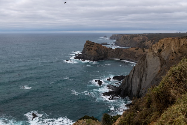 Beautiful rocky coastline and blue sea in Portugal