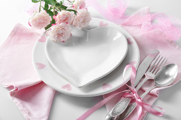 Beautiful romantic table setting with flowers