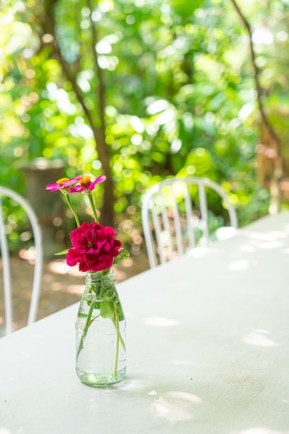 Beautiful rose flower in vase decorated on table