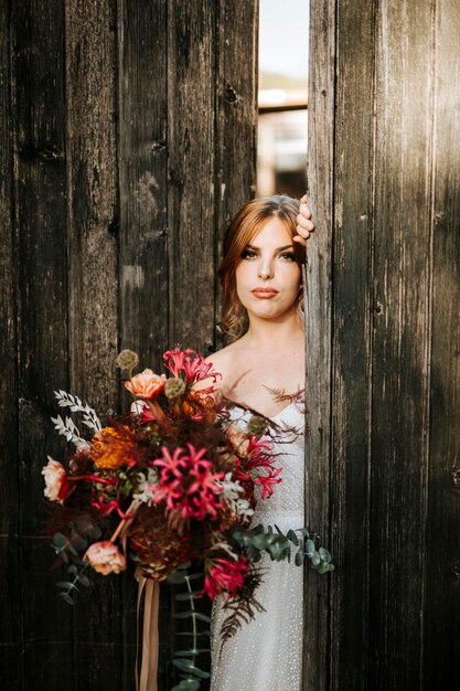 Beautiful rustic bride with a bouquet