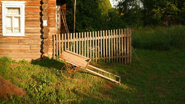 Beautiful rustic summer landscape Old wooden log houses Vologda region