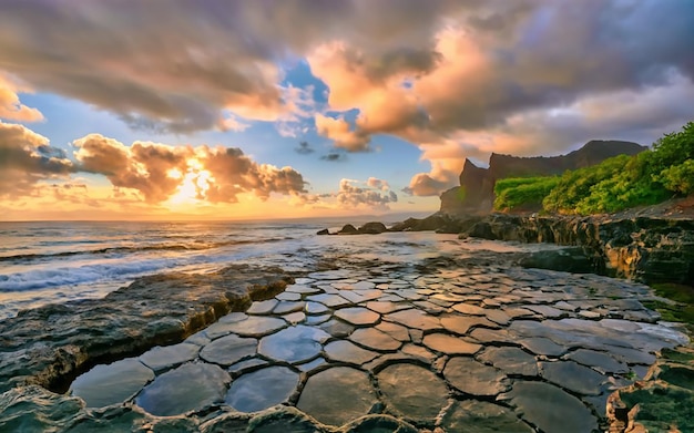 Beautiful scenery of rock formations by the sea at queens bath kauai hawaii at sunset