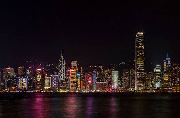 Beautiful scenic night view of victoria habour and building on hong kong island.