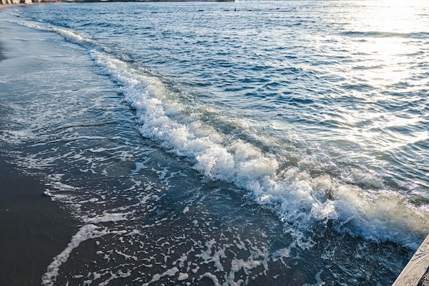 Beautiful sea or ocean waves coast view from tropical sand beach summer vacation travel and holiday destination