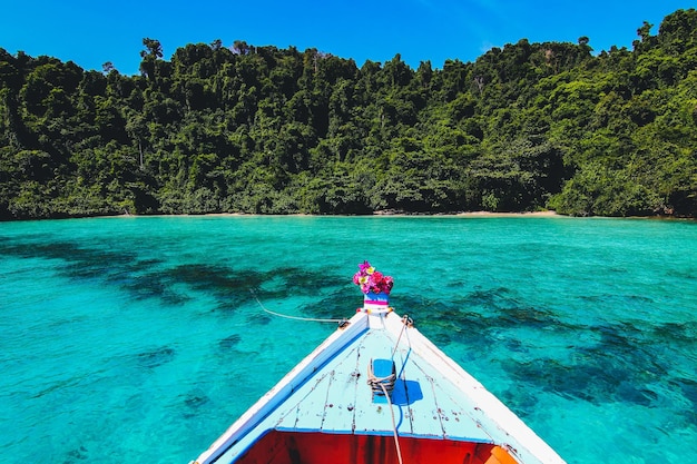 Beautiful sea view on boat with clear sky and island