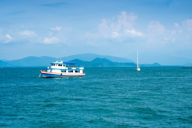 Beautiful sea view with boat against blue sky 