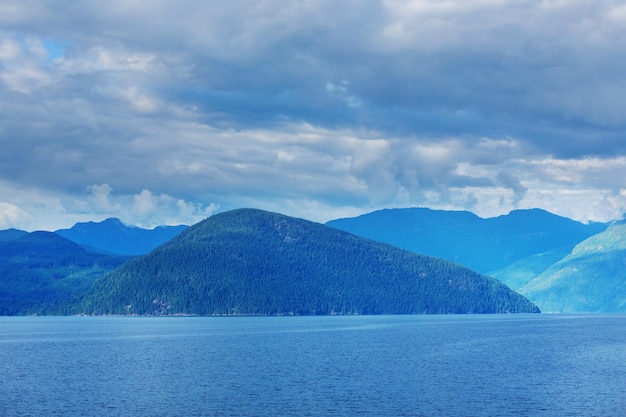 Beautiful seascape along Pacific coast of British Columbia, Canada, with rocky shoreline.