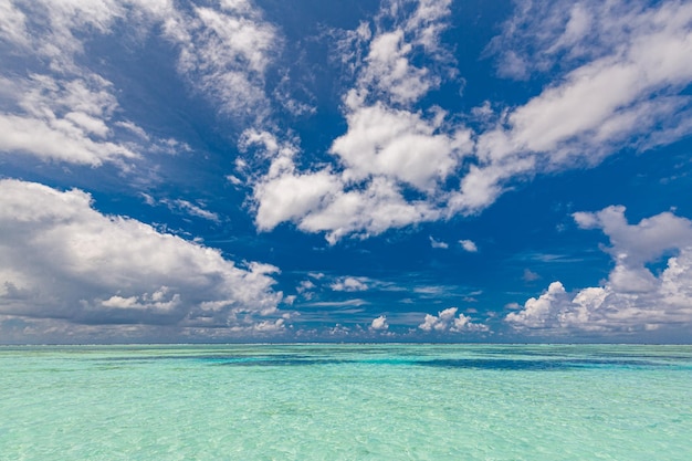 Beautiful seascape panorama, sunny blue sky with clouds. Idyllic Earth wallpaper.