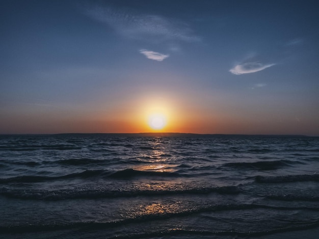 Beautiful seascape with the sun near the horizon.