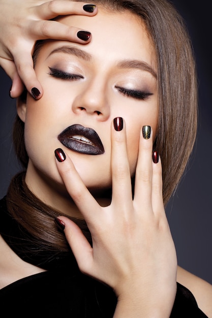 Beautiful sexy girl with black lips and perfect hair