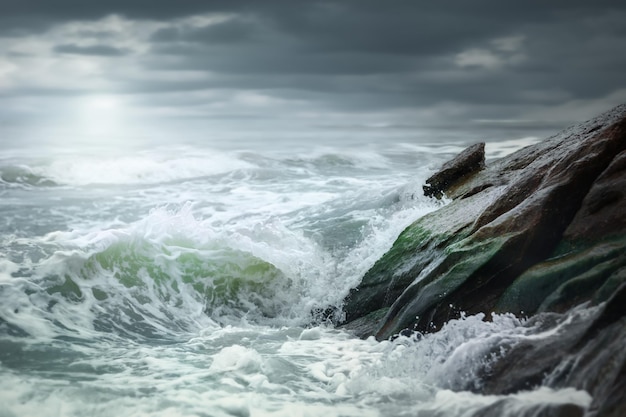 Beautiful shot of seascape with splashing sea waves on sunny daySummer vacation background