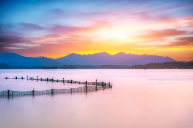 The beautiful of silhouette sunset landscape scenery of Xihu West Lake and pavilion in Hangzhou CHINA