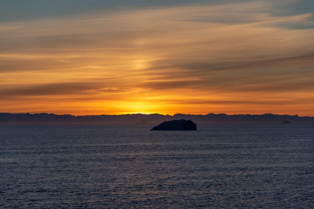 Beautiful sinrise in Greenland. Iceberg at sea.