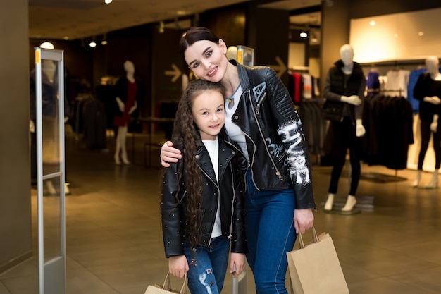 Beautiful sisters shopping in a mall