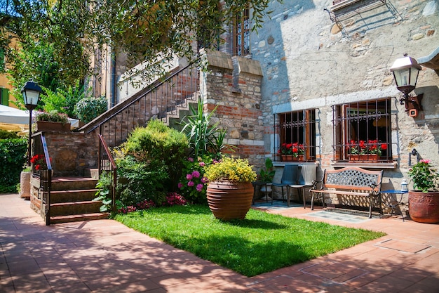 Beautiful small patio with staircase in Sirmione, Lake Garda, Italy