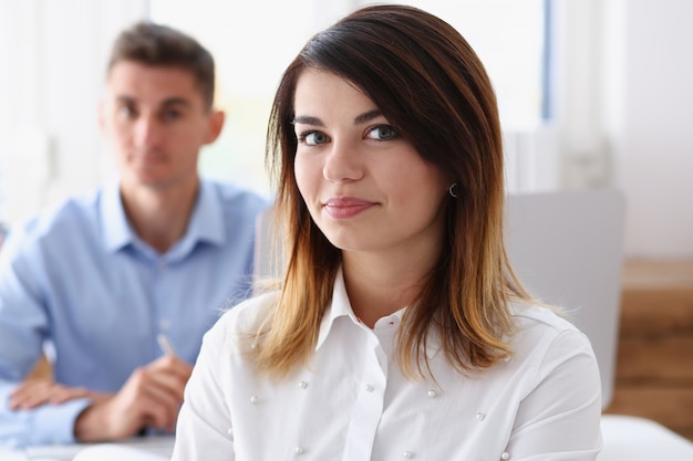 Beautiful smiling businesswoman portrait at workplace