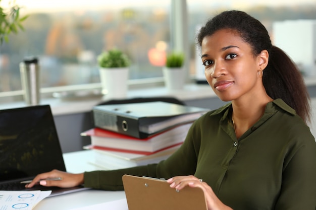 Beautiful smiling businesswoman portrait workplace