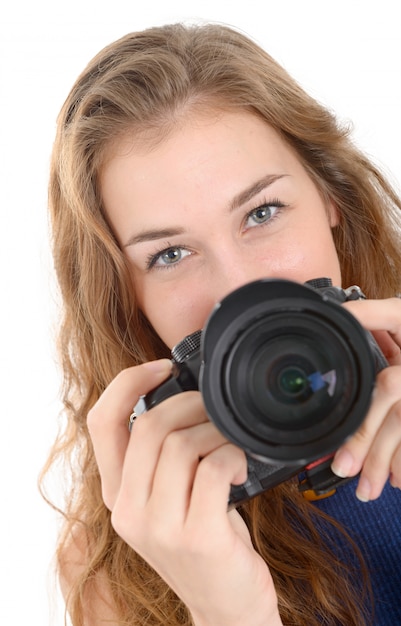 Beautiful smiling woman with digital camera, on white