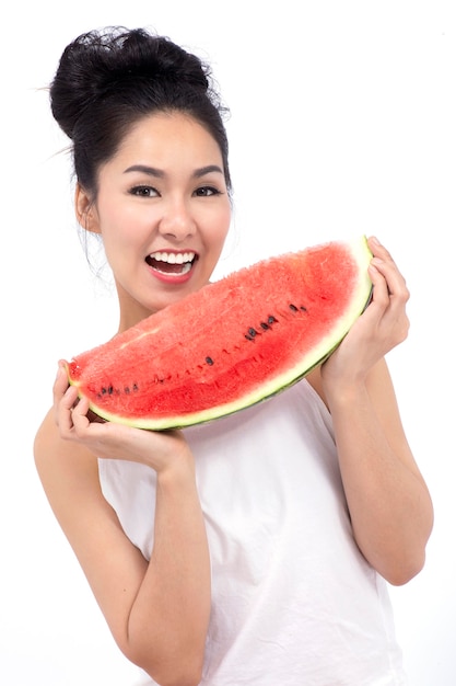 Beautiful smiling young woman cheerful beauty Asian model with Watermelon.