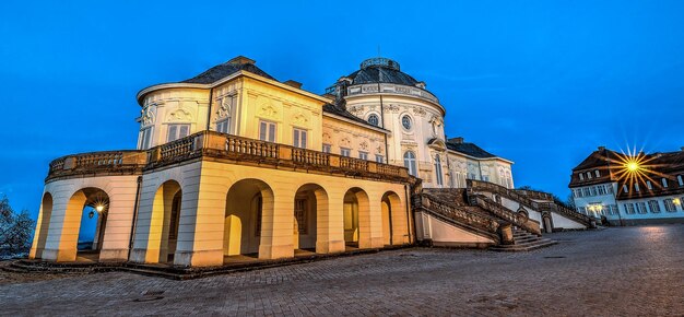 Beautiful Solitude Palace in Stuttgart Germany against a blue night sky