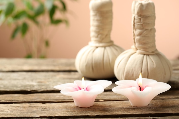 Beautiful spa composition on wooden table on brown background