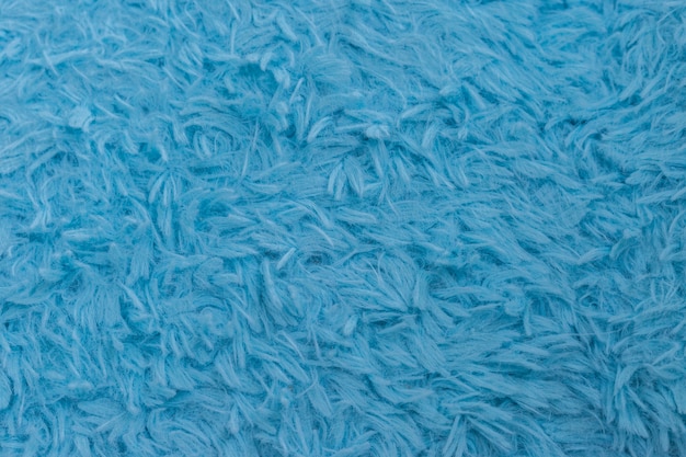 Beautiful sparkling artificial blue fur texture background