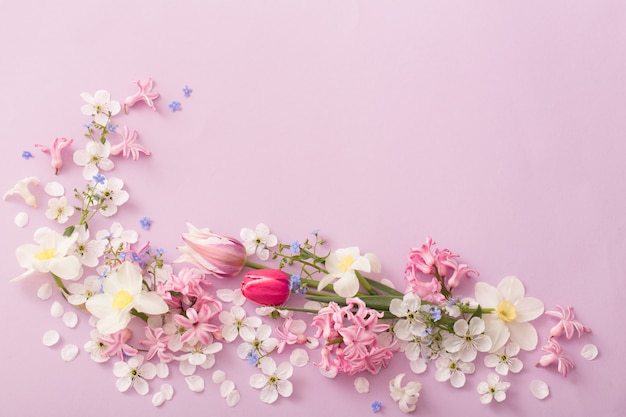 Beautiful spring flowers on paper background