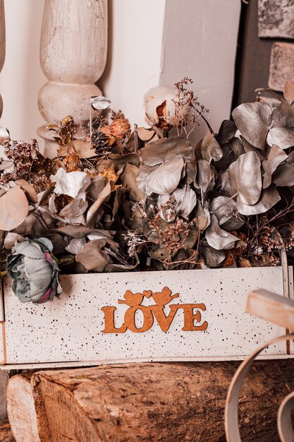 Beautiful stylish interior with fireplace and dried flowers