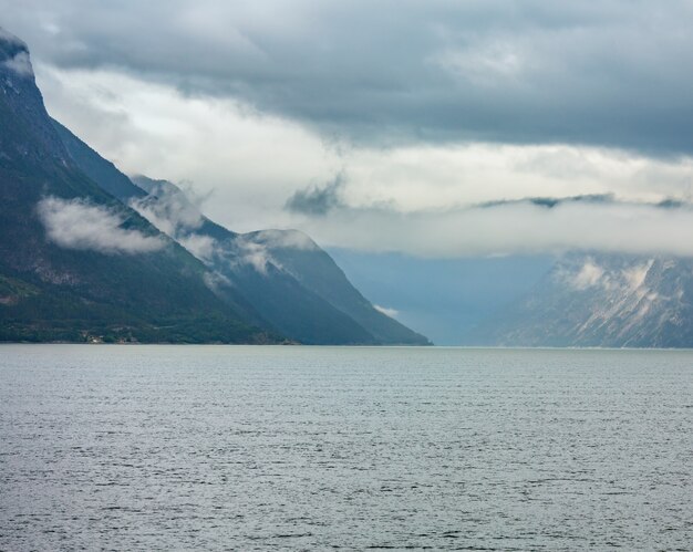 Photo beautiful summer cloudy evening fjord view, norway