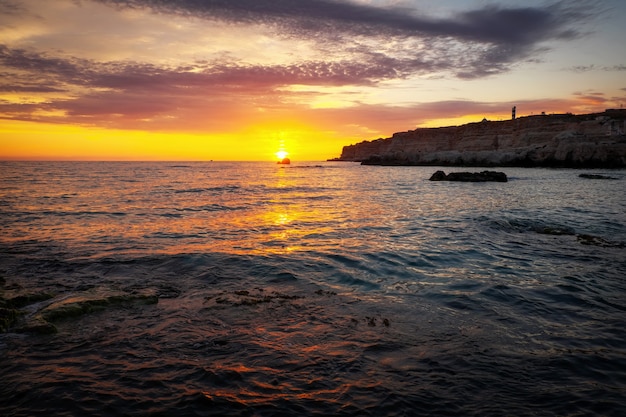 Beautiful summer landscape with sunset, colorful sky and sea. Composition of nature