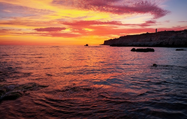 Beautiful summer landscape with sunset, colorful sky and sea. Composition of nature